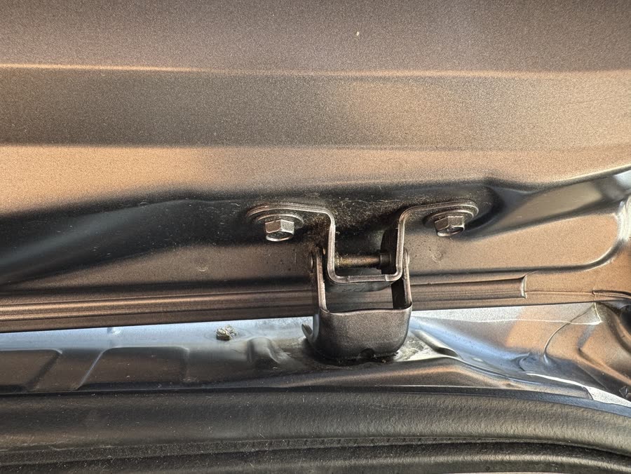Boot shut line and hinge area, cleaned out and warmly lit